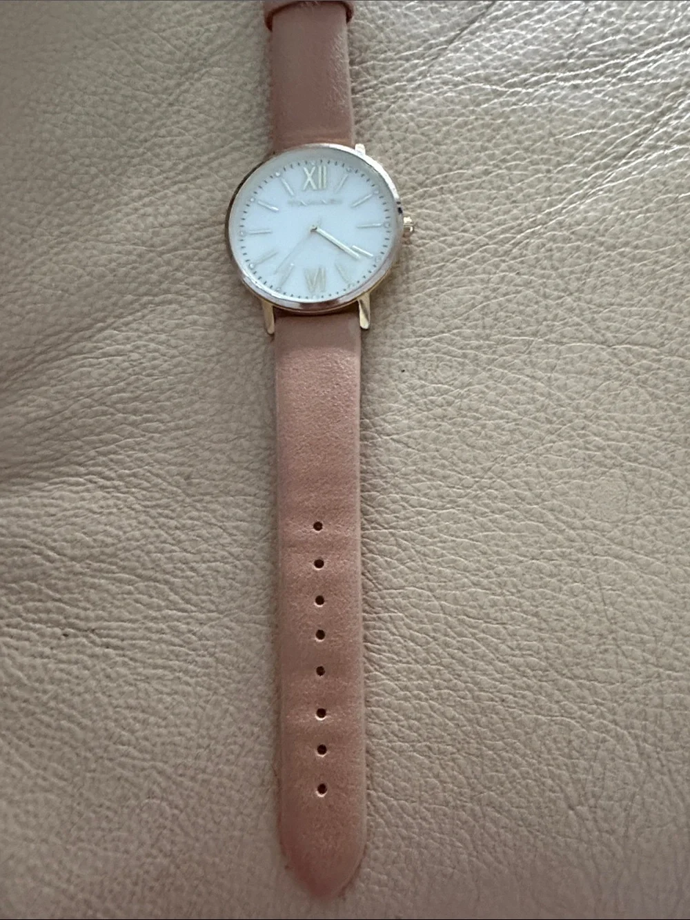 Tahari Blush Leather Strap Watch with Rose Gold Accents needs battery